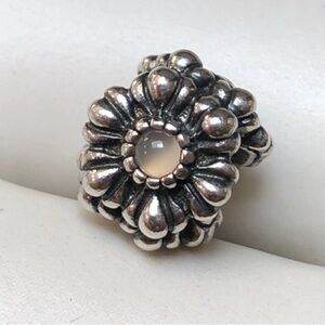 Pandora gorgeous flower charm with light pink stones